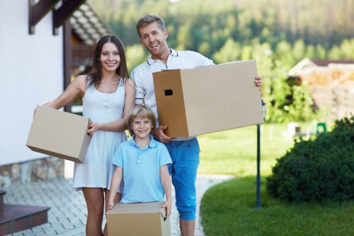 Careful packing of office equipment and documents for relocation