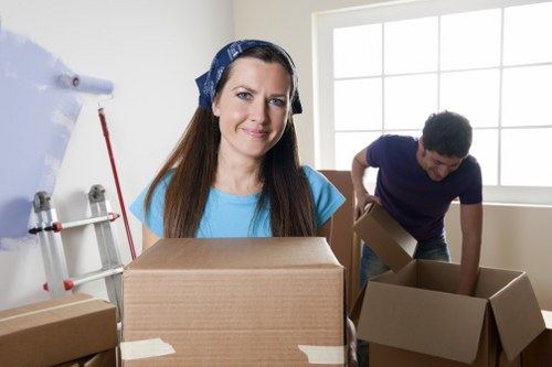 Moving boxes and furniture for a short-notice house move in South London