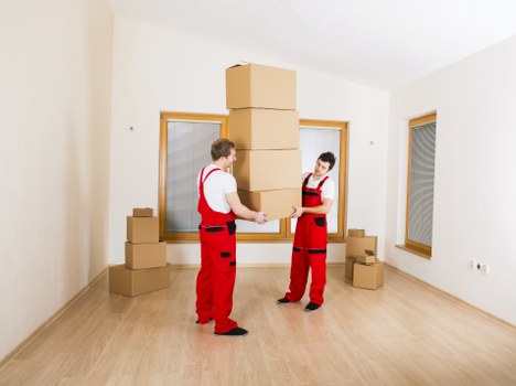 Moving team handling student belongings in South London residential area